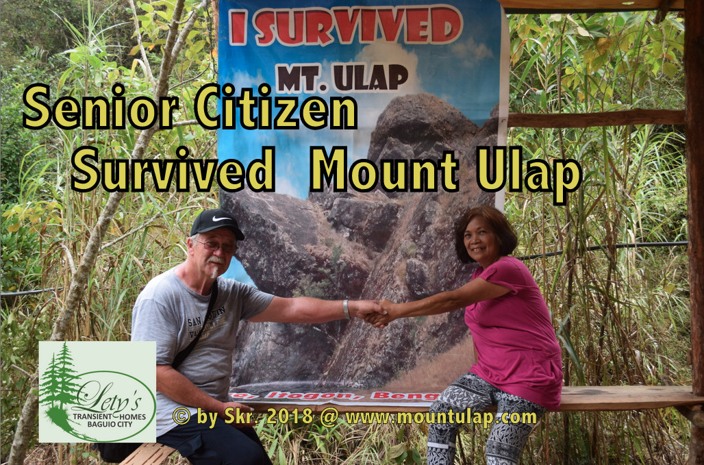Finally, we make it, two Senior Citizens arriving at the Exit Point in Sta. Fe posing in front of the I SURVIVED billboard. 