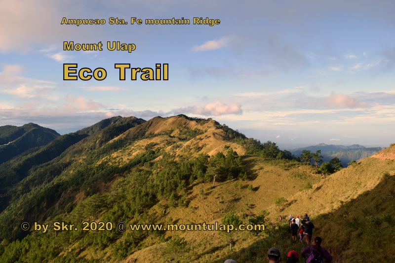 Sunrise at dawn, on the Mount Ulap Eco-Trail Mountain Path Hikers en route to Mount Ulap summit during early morning dawn. 